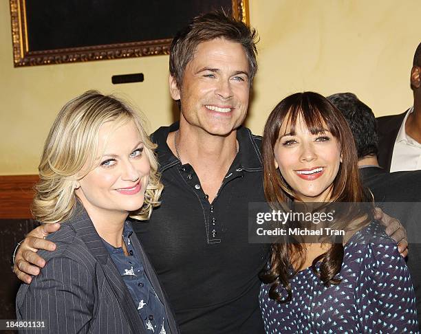 Amy Poehler, Rob Lowe and Rashida Jones attend the "Parks And Recreation" 100th episode celebration held at CBS Studios - Radford on October 16, 2013...