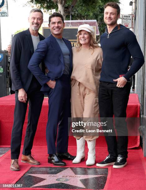 David Efron, Zac Efron, Starla Baskett and Dylan Efron attend the Hollywood Walk of Fame Star Ceremony Honoring Zac Efron on December 11, 2023 in...