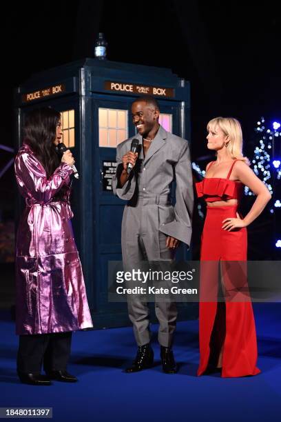 Yinka Bokinni with Ncuti Gatwa and Millie Gibson as Ncuti Gatwa illuminates The London Eye in tribute to his new title role in "Doctor Who" at London...