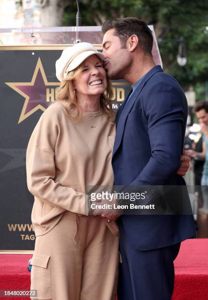 Starla Baskett and Zac Efron attend the Hollywood Walk of Fame Star Ceremony Honoring Zac Efron on December 11, 2023 in Hollywood, California.