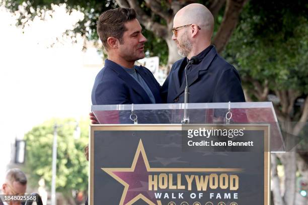 Zac Efron and Sean Durkin attend the Hollywood Walk of Fame Star Ceremony Honoring Zac Efron on December 11, 2023 in Hollywood, California.