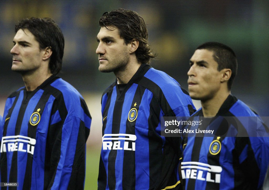 Christian Vieri of Inter Milan lines up alongside team-mate Ivan Cordoba