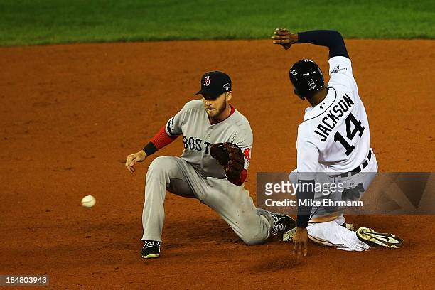 Austin Jackson of the Detroit Tigers steals second base in the fourth inning against Stephen Drew of the Boston Red Sox during Game Four of the...