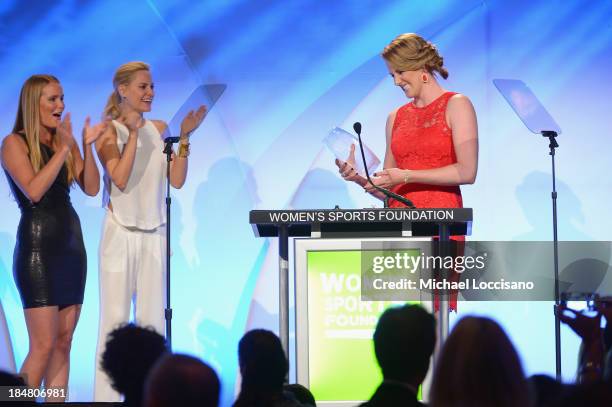 Grete Eliassen and Aimee Mullins present Olympic gold medalist Missy Franklin with the Individual Sports Woman of the Year Award onstage during the...