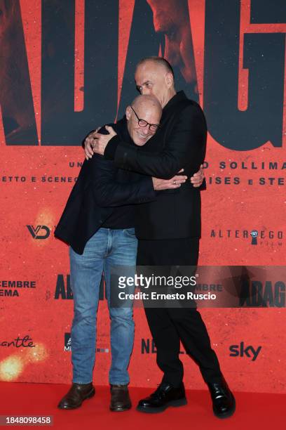 Stefano Bises and director Stefano Sollima attends the red carpet for the movie "Adagio" at The Space Parco De Medici on December 11, 2023 in Rome,...