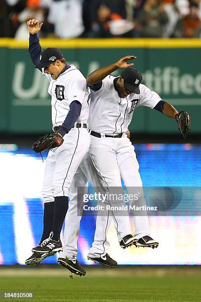 Don Kelly Austin Jackson and Torii Hunter of the Detroit Tigers celebrate their 7 to 3 win over the Boston Red Sox in Game Four of the American...