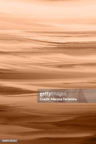 universal background with paint streaks. fluid background. abstract background. background with paints. color trend 2024 is peach fuzz. peach background. - dark fruit ink stock pictures, royalty-free photos & images