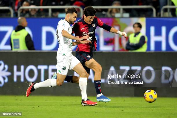 Pantelis Hatzidiakos of Cagliari in contrast during the Serie A TIM match between Cagliari Calcio and US Sassuolo at Sardegna Arena on December 11,...