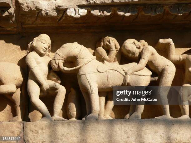 This sculpture can be found on the exterior of the Lakshmana temple, part of the Western Group of monuments in Khajuraho in India.