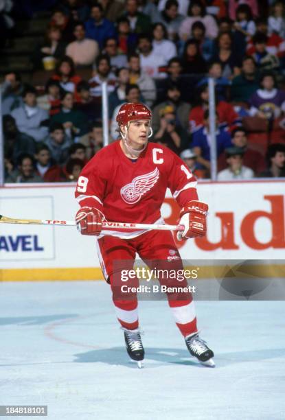 Steve Yzerman of the Detroit Red Wings skates on the ice during an NHL game in December, 1988.