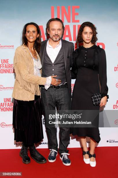 Karine Silla, Vincent Perez and Iman Perez attend the "Une Affaire D'Honneur" Premiere At Cinema UGC Normandie on December 11, 2023 in Paris, France.