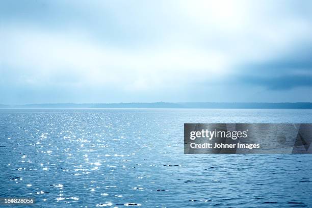 sunlight reflecting in sea - summer 2013 stock pictures, royalty-free photos & images