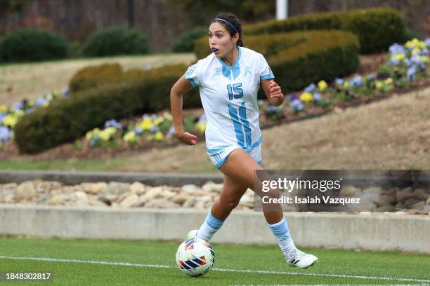 Viviana Soto-Herrera of the Washburn Ichabods moves the ball against the Point Loma Sea Lionsduring the Division II Women's Soccer Championship held...