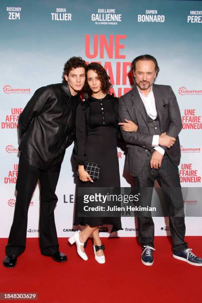Noham Edje, Iman Perez and Vincent Perez attend the "Une Affaire D'Honneur" Premiere At Cinema UGC Normandie on December 11, 2023 in Paris, France.