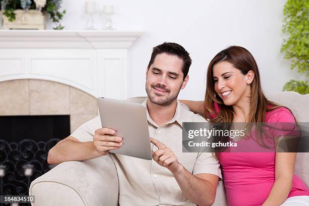 tablet computer at home - gchutka stock pictures, royalty-free photos & images