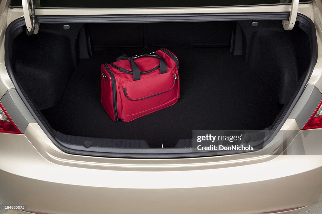 Luggage in Car Trunk