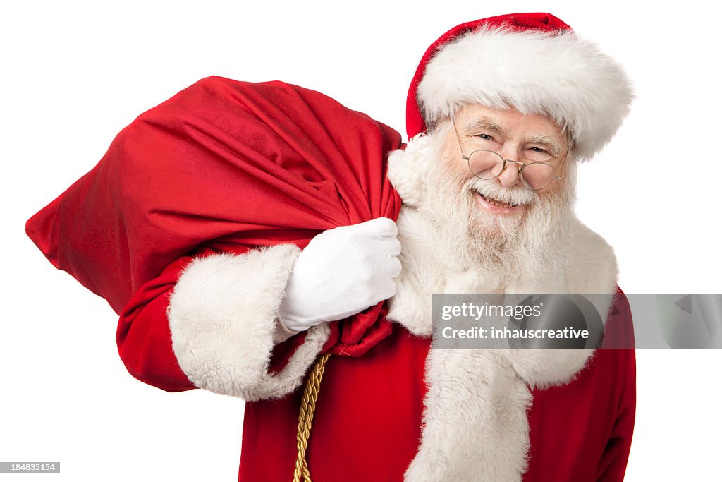 Bilder von echten Santa Claus tragen eine Geschenktasche