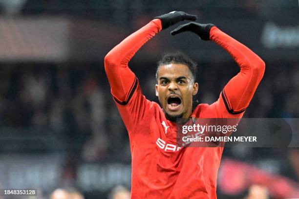 Rennes' French defender Lorenz Assignon celebrates after scoring his team's first goal during the UEFA Europa League group F football match between...