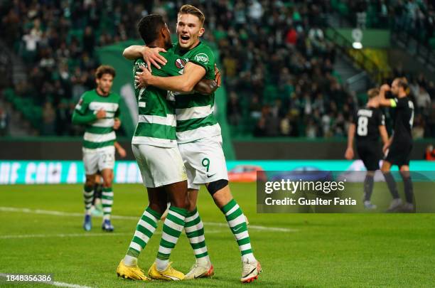 Viktor Gyokeres of Sporting CP celebrates with teammate Matheus Reis of Sporting CP after scoring a goal during the Group D - UEFA Europa League...