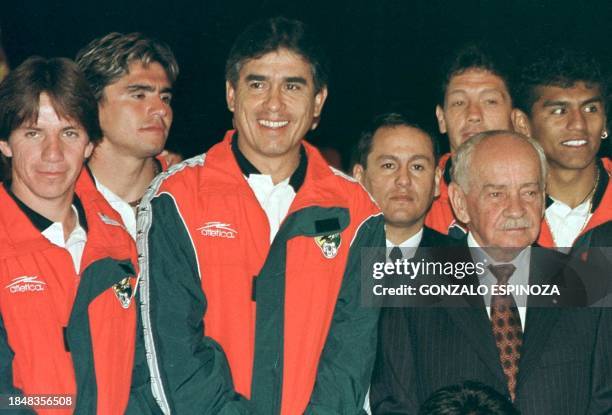 The president of Bolivia, Hugo Banzer Suarez next to the team members of the Bolvian soccer team, Luis Cristaldo , Jaime Moreno, Carlos Aragones ,...