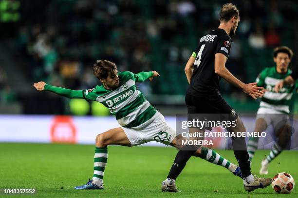 Sporting's Portuguese midfielder Daniel Braganca vies with Sturm Graz's Slovenian midfielder Jon Stankovic during the UEFA Europa League 1st round...