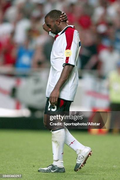 June 24: Darius Vassell is dejected after missing penalty during the UEFA Euro 2004 Quarter Final match between Portugal and England at Luz Stadium...