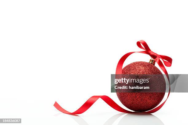 christmas ball & red ribbon - christmas decorations isolated stock pictures, royalty-free photos & images