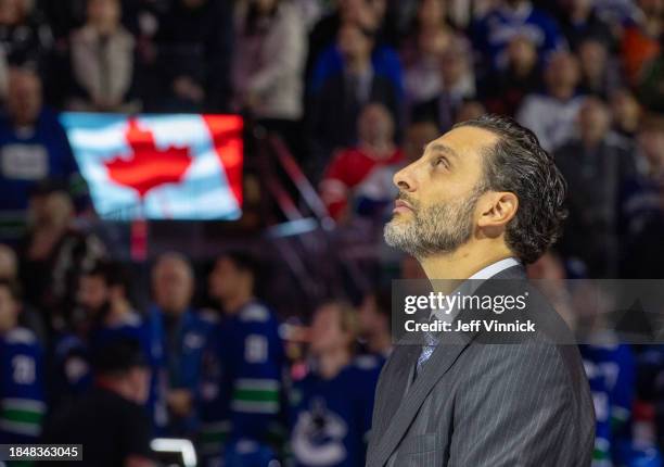 Former Vancouver Canucks goaltender Roberto Luongo stands for the national anthem before the Vancouver Canucks NHL game against the Florida Panthers...