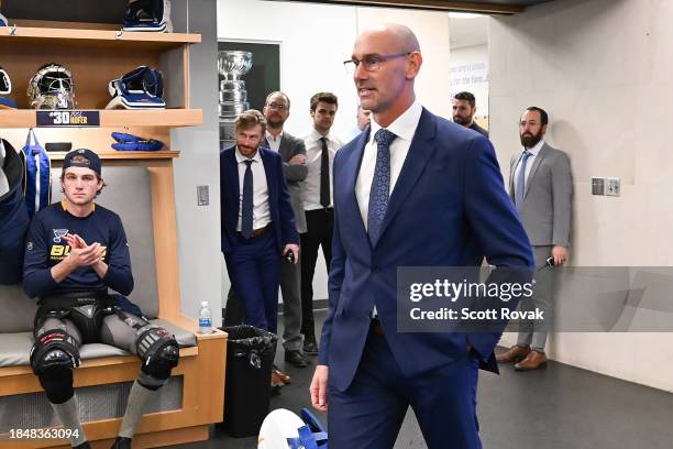 Interim Head Coach Drew Bannister address the St. Louis Blues after beating the Ottawa Senators 4-2 on December 14, 2023 at the Enterprise Center in...