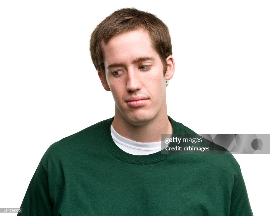 Concerned Young Man Looks Down