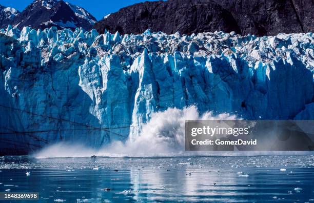 tidewater glacier calving into alaskan inlet - inside passage stock pictures, royalty-free photos & images