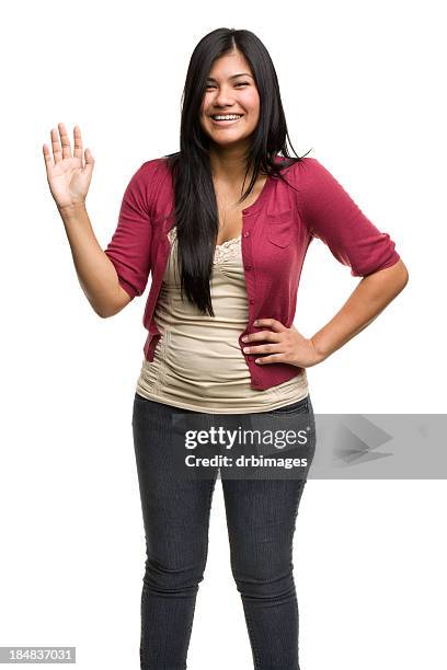 happy young woman waving - woman waving stock pictures, royalty-free photos & images