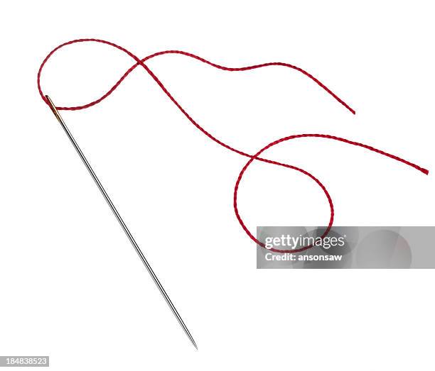 needle and thread - rode draad stockfoto's en -beelden