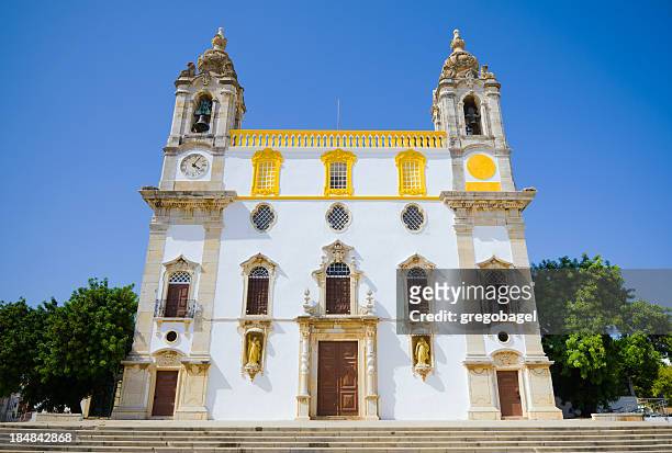 facade of igreja do carmo in faro, portugal - faro portugal stock pictures, royalty-free photos & images