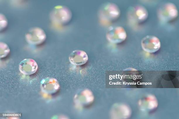 shimmering diamond rhinestones texture background - rhinestone texture stock pictures, royalty-free photos & images