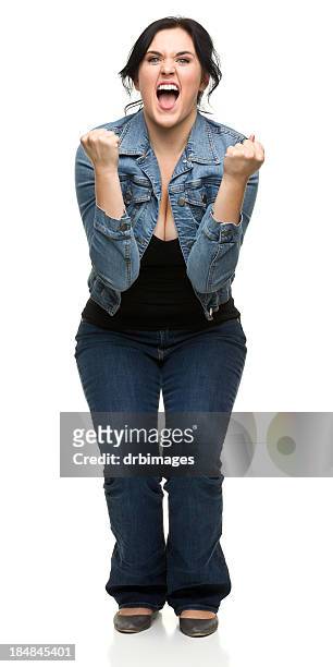 excited young woman pumping fists - yes stockfoto's en -beelden