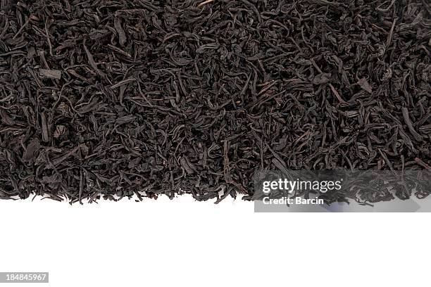 hojas de té negro - hojas de té secas fotografías e imágenes de stock