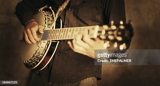 street banjo player - country and western music stock pictures, royalty-free photos & images
