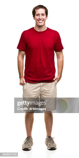 standing young man - red shirt stock pictures, royalty-free photos & images