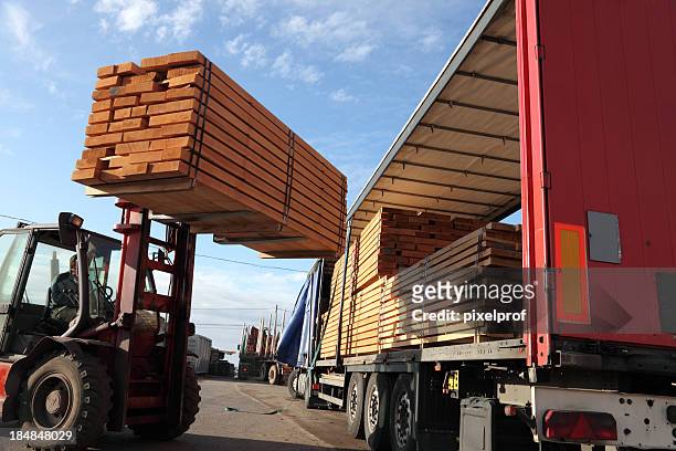 forklift loading truck - mode of transport stock pictures, royalty-free photos & images