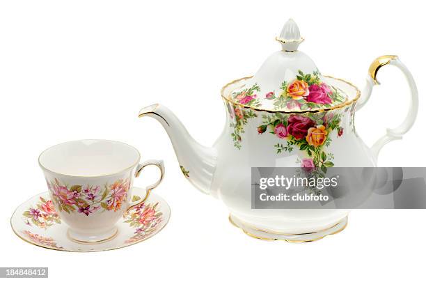 vintage bone china teapot with a cup and saucer - theepot stockfoto's en -beelden