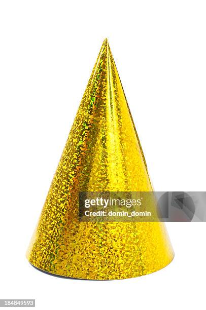 single yellow party hat isolated on white background - hat stockfoto's en -beelden