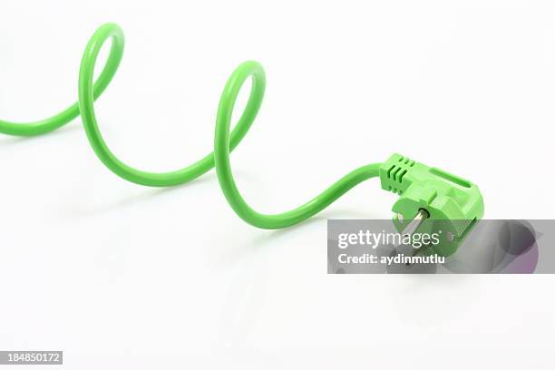 green power plug - wire stock pictures, royalty-free photos & images