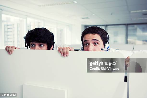 office espionage - peeking cubicle stock pictures, royalty-free photos & images