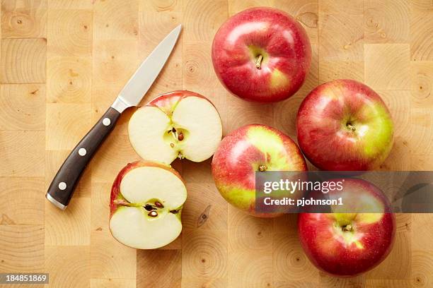 slicing apples - cutting green apple stock pictures, royalty-free photos & images