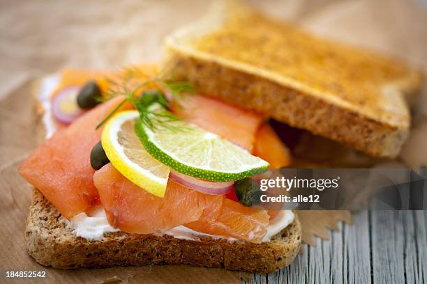 toast with smoked salmon - smoked salmon stock pictures, royalty-free photos & images