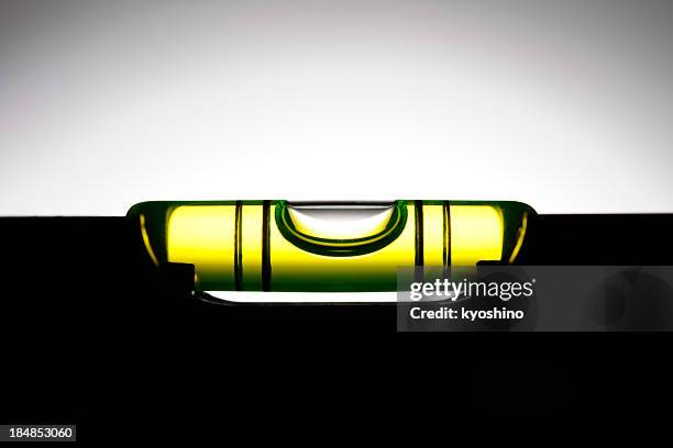 silhouette of level against white background - spirit level stock pictures, royalty-free photos & images