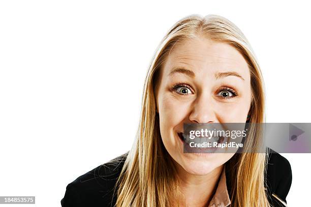 isolated on white, cute young blonde gives toothy smile - cheesy grin stock pictures, royalty-free photos & images