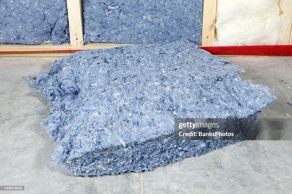 Recycled Blue Jean Denim Insulation Near Wall Frame High-Res Stock