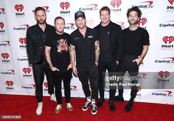 Brent Kutzle, Eddie Fisher, Ryan Tedder, Zach Filkins, and Brian Willett of OneRepublic attend iHeartRadio Hot 99.5's Jingle Ball 2023 at Capital One...